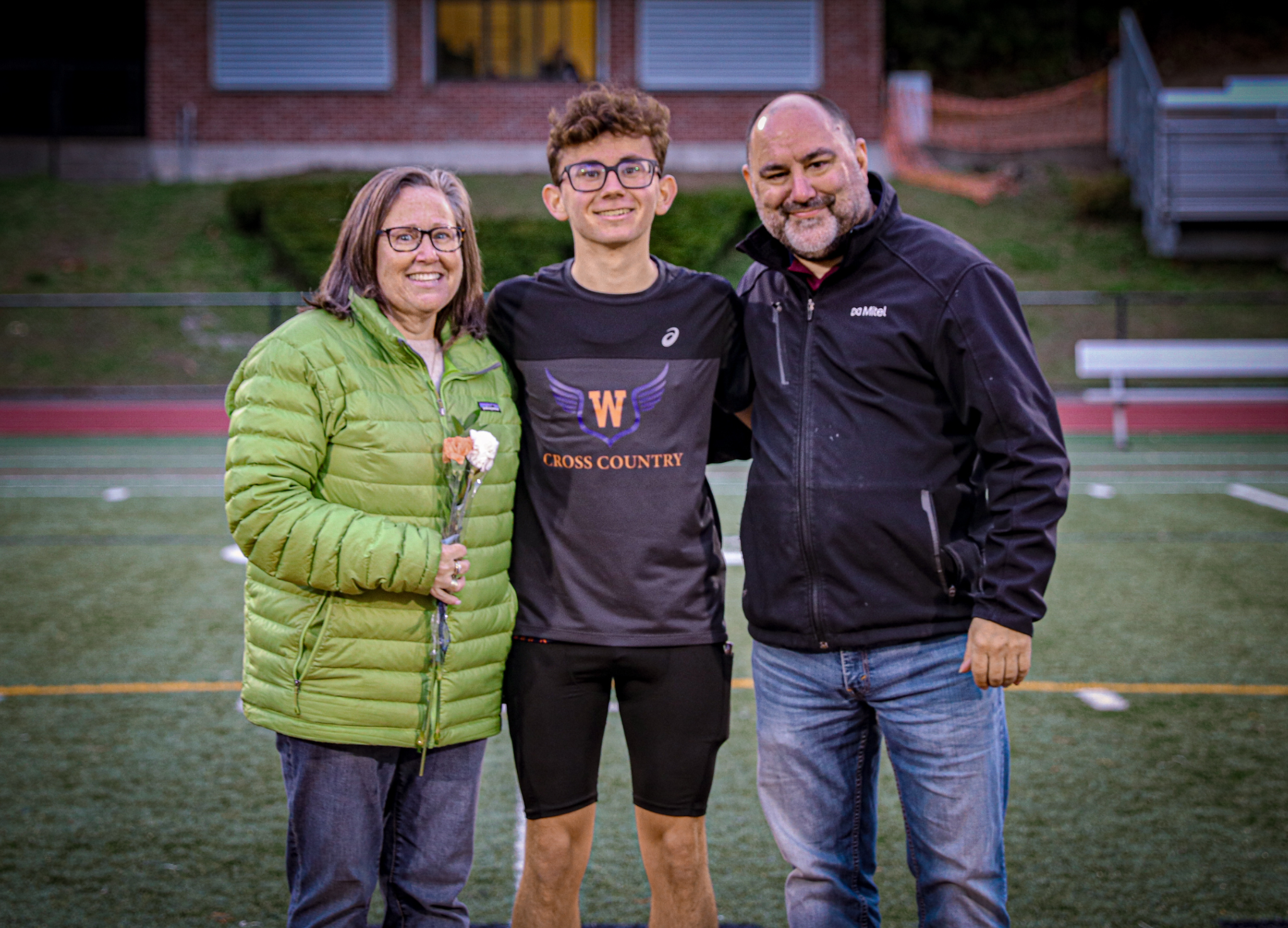 Ethan Barossi with his parents