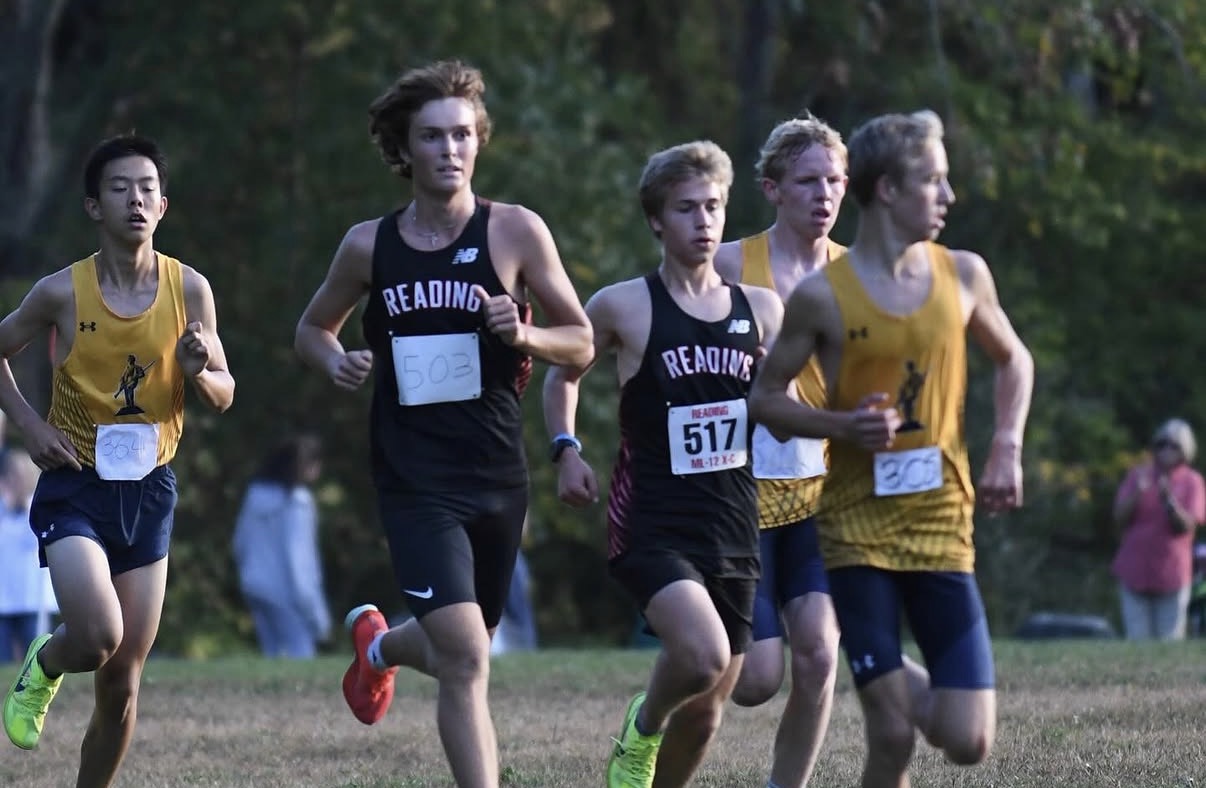 High school cross country runners competing in a race